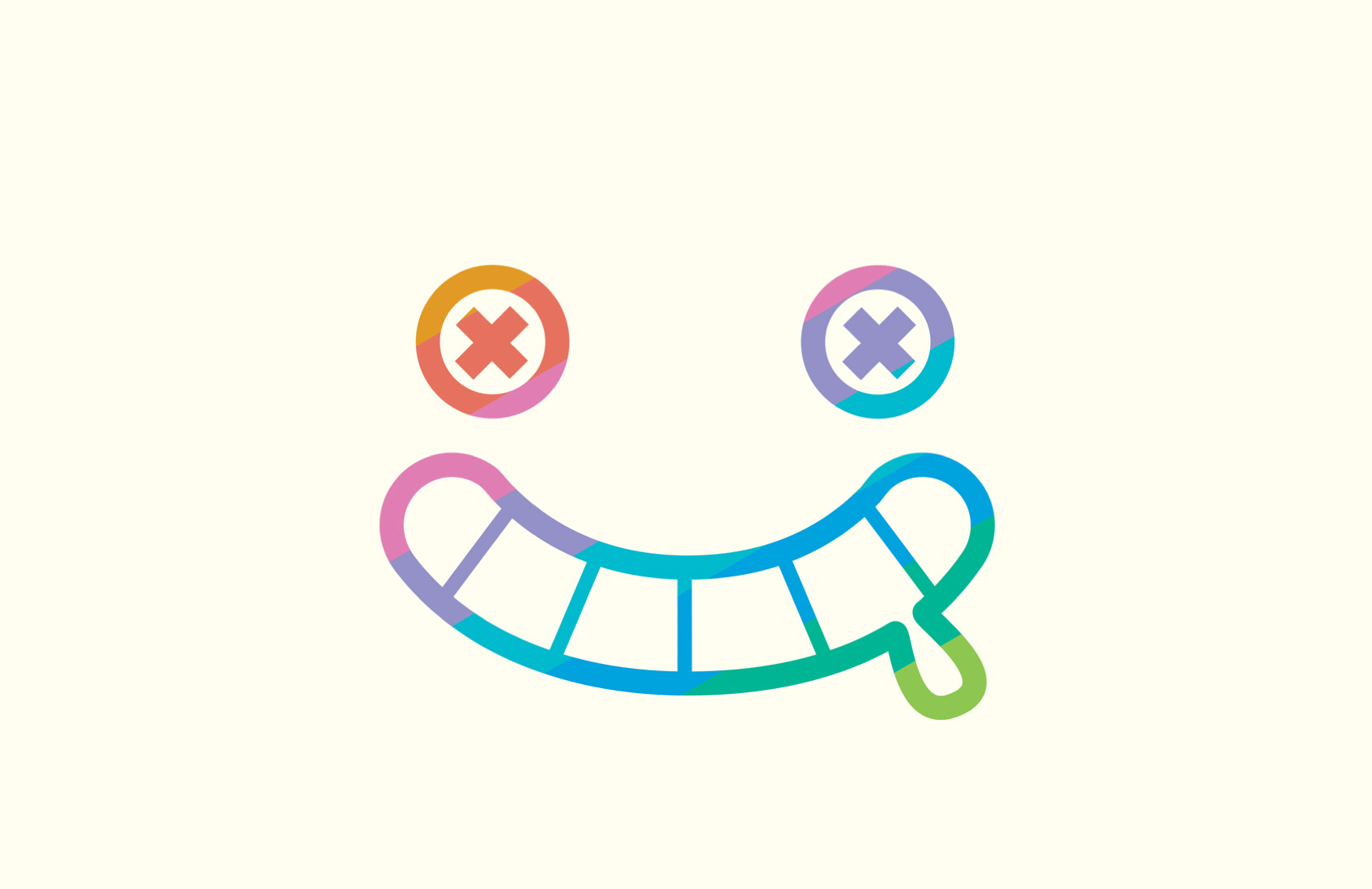 Playful multicolored face with crossed eyes and an exaggerated grin